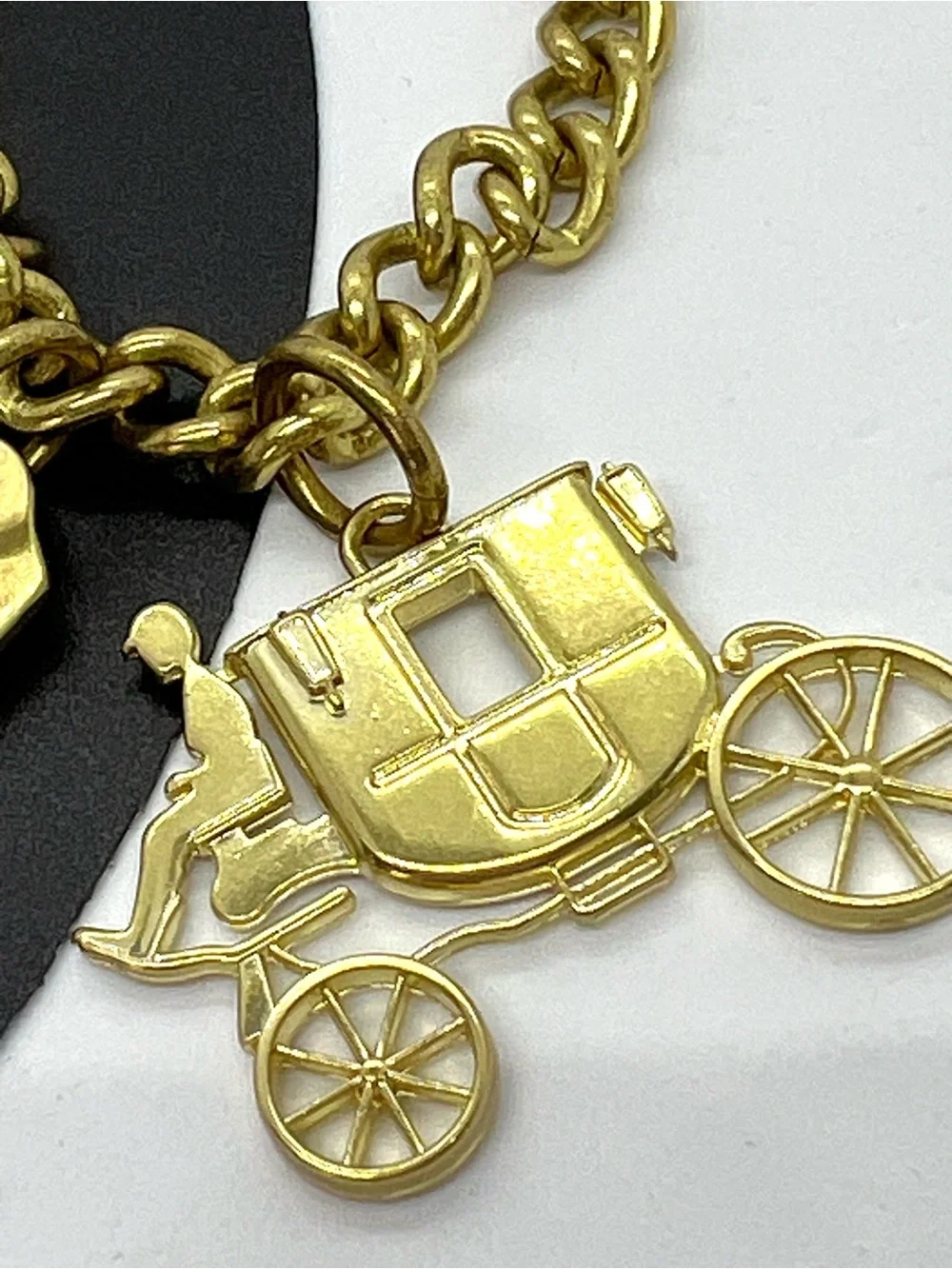 Coach Gold Tone Charm Bracelet with Carriage Charms